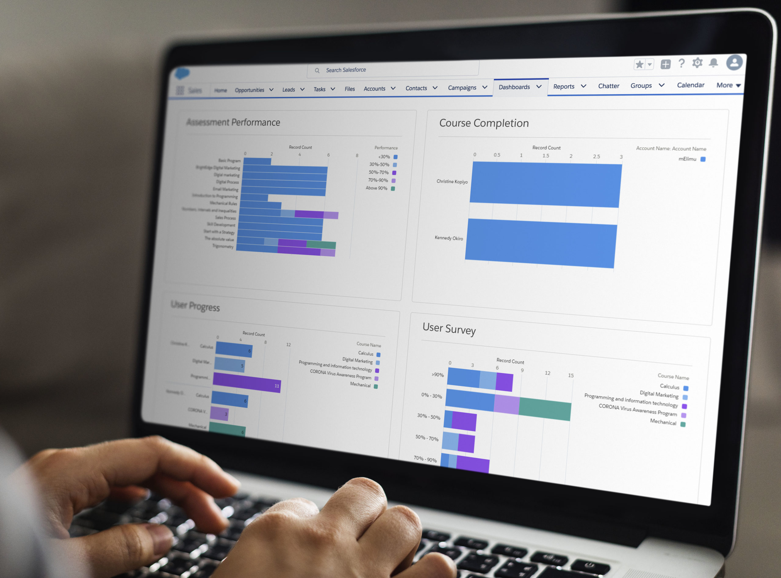 Working on a web template on the laptop Salesforce LMS Integration infographic